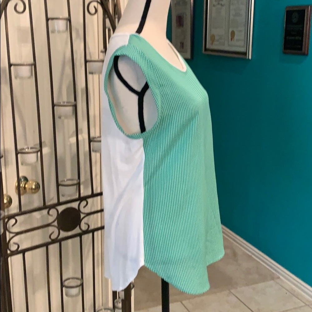 Green checked rayon top with white back.